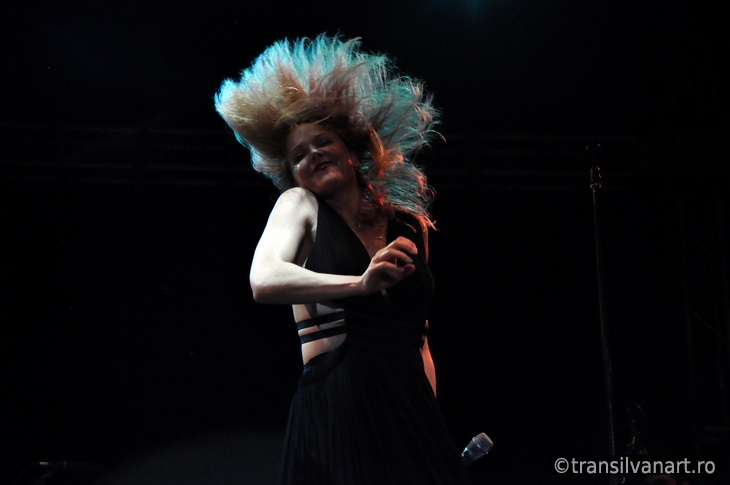 Vocalist woman performs live on the stage