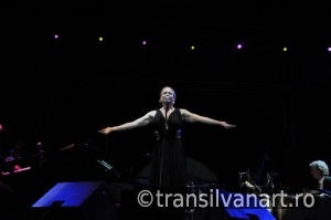 Vocalist from Pink Martini band performs live on the stage