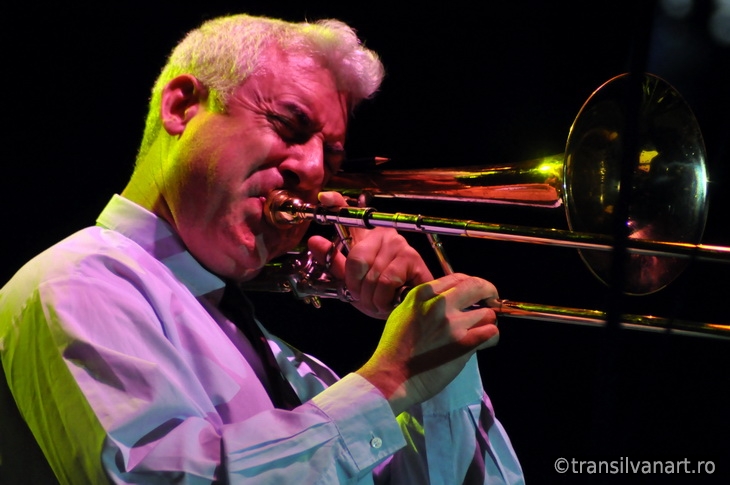Trombonist from Pink Martini band performs live on the stage