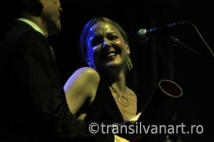 Singer from Pink Martini band performs live on the stage