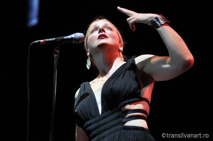 Vocalist woman performs live on the stage