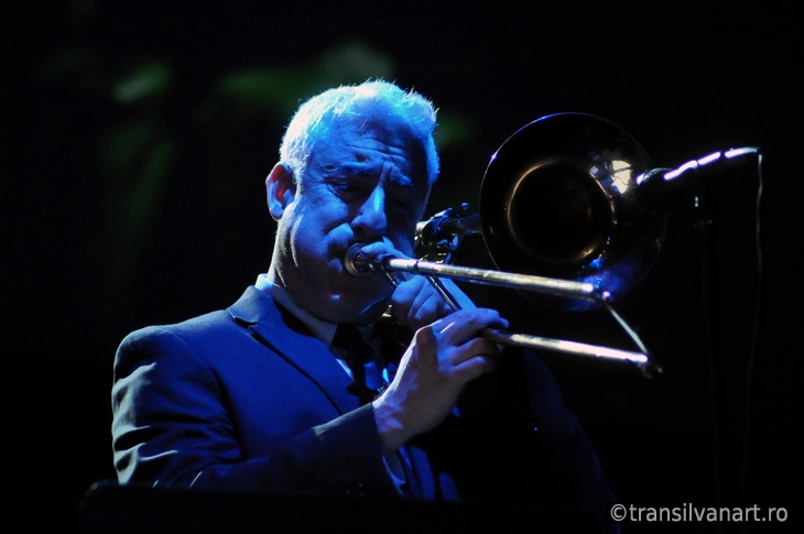 Trombonist from Pink Martini band performs live on the stage