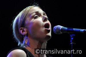Singer from Pink Martini band performs live on the stage