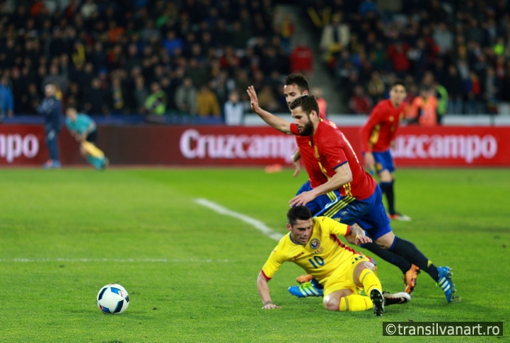 Romanian football player Nicolae Stanciu in action against Spain