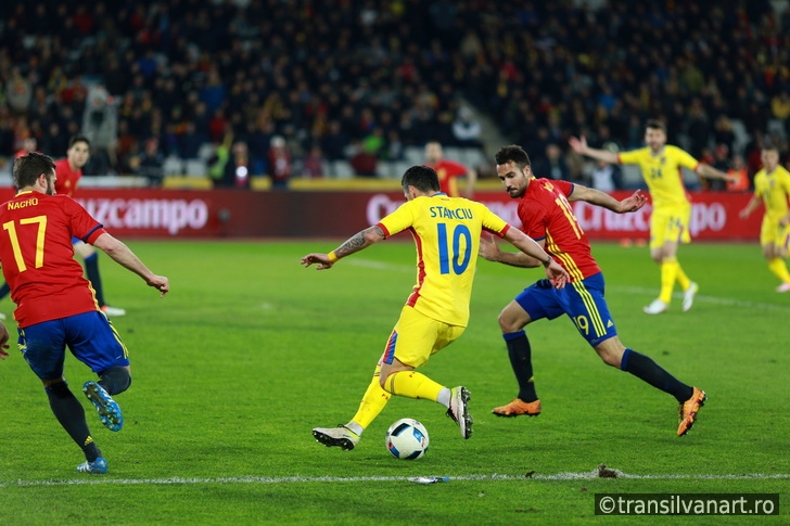 Romanian football player Nicolae Stanciu in action against Spain