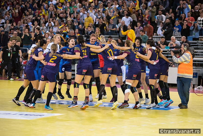 Women handball players celebrating victory