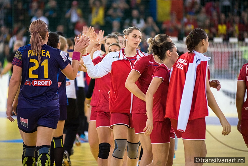 Women handball players celebrating victory