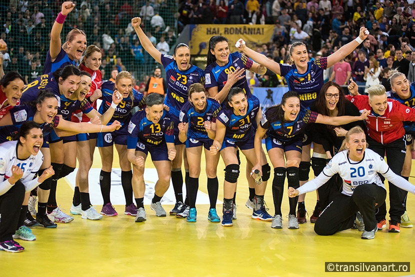 Women handball players celebrating victory